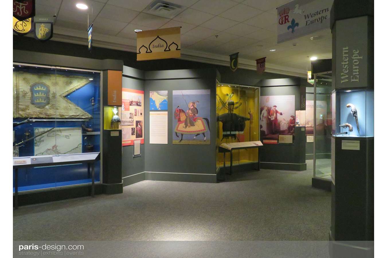 4W 7yrs 2 : Each thematic zone in this gallery has coordinated colors, logos, banners, flags, maps, and graphics